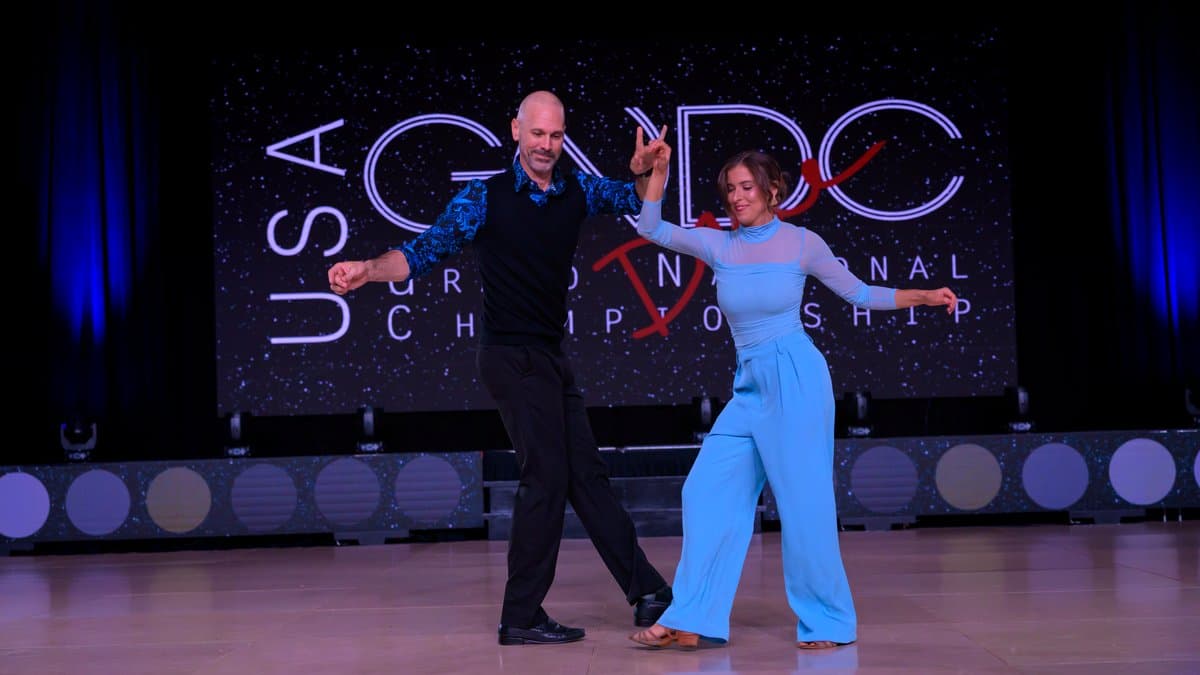 Steve and Myers mid-turn during a performance at the USA Grand National Dance Championship.